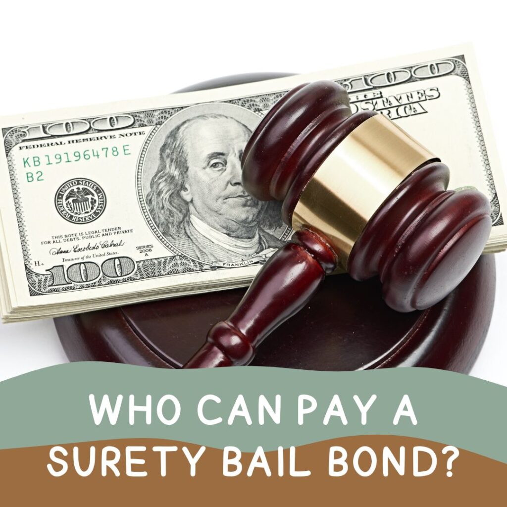 Who can pay a Surety Bail Bond? - Judge's gavel sitting on a stock of American dollar.